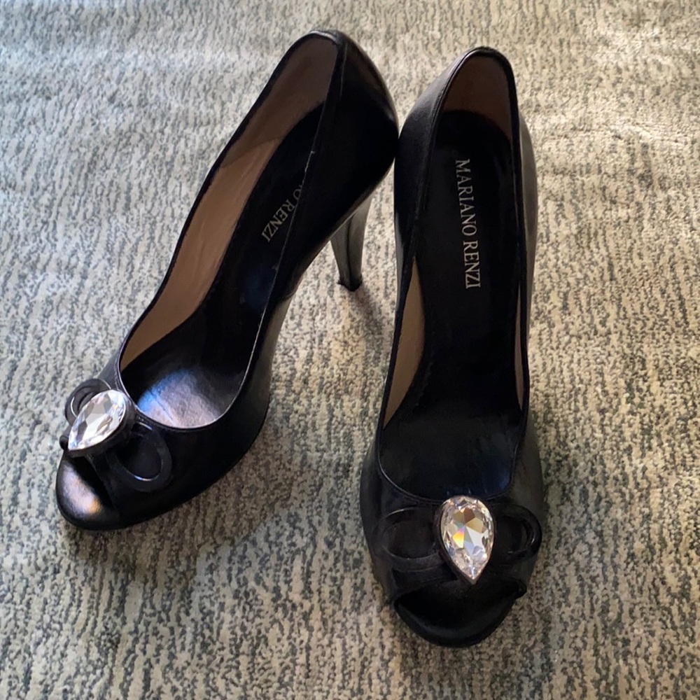 Black leather peek a boo pumps with rhinestone